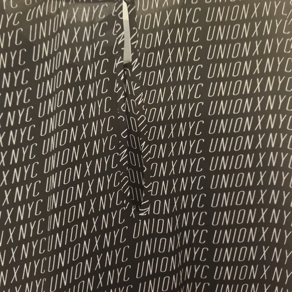 Gabrielle Union NYC Asymmetrical Top Blouse Size XL Black and white